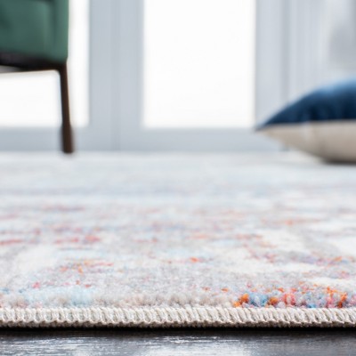 Handmade Blue and Rust Synthetic 5' x 7' Area Rug