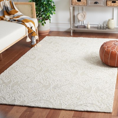 Handmade Ivory Wool Floral Tufted Rug - 3' x 5'