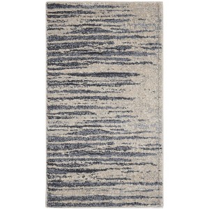 Nourison Home Moroccan Celebration Abstract Stripe Area Rug Blue/Beige 2'2" x 3'9" - 1 of 4