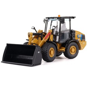 CAT Caterpillar 906 Electric Compact Wheel Loader Yellow with Operator "High Line Series" 1/50 Diecast Model by Diecast Masters - 1 of 4