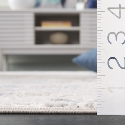 Ivory 4' x 6' Stain-Resistant Synthetic Rectangular Rug