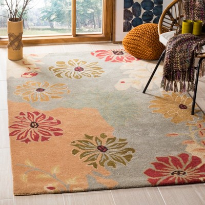 Handmade Floral Elegance Round Blue Wool Rug, 47 in