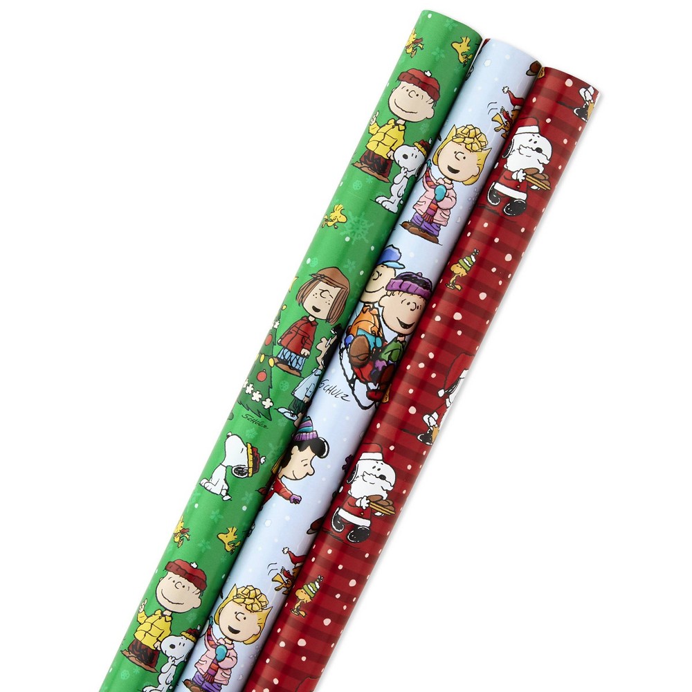 Hallmark Christmas Peanuts Wrapping Paper with Cut Lines on Reverse (Pack of 3, 105 sq. ft. ttl) Snoopy, Charlie Brown, Woodstock