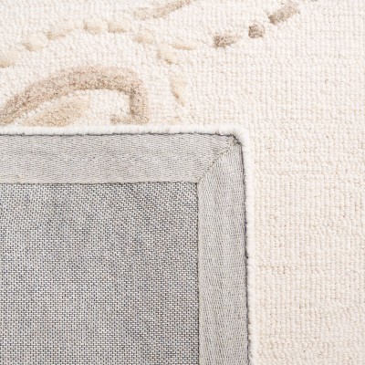 Ivory and Beige Floral Hand-Tufted Wool Area Rug 5' x 8'
