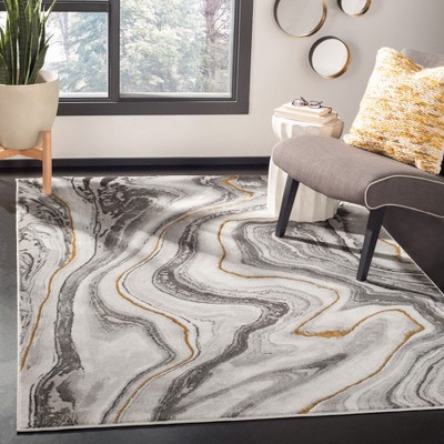 Grey and Gold Abstract 4' x 6' Stain-Resistant Synthetic Rug