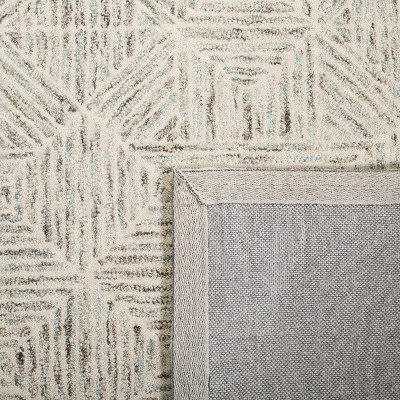 Light Blue Handmade Wool Abstract 6' x 9' Area Rug