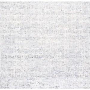 Ebony EBN216 Hand Tufted Indoor Rugs - Safavieh - 1 of 4