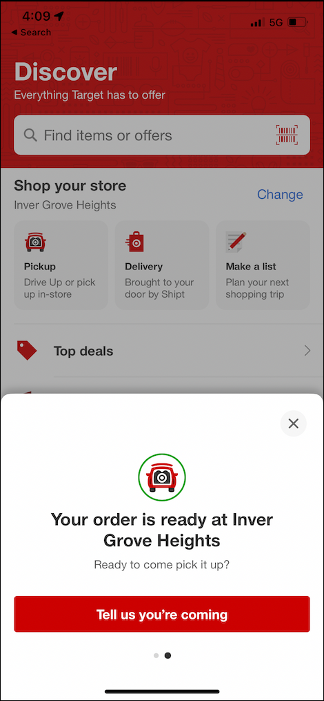 Screenshot of Target's guest app, showing that an order is ready for Drive Up at the Inner Grove Heights Target store. There's a large red button that says 'tell us you're coming' at the bottom of the screen.