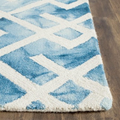 Blue and Ivory Hand-Tufted Wool 4' x 6' Area Rug