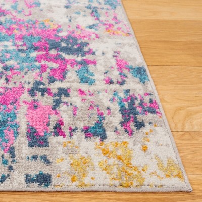 Ivory and Blue Abstract Synthetic Area Rug, 6' x 9'