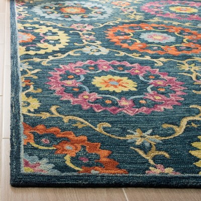 Handmade Blue Floral Wool 5' x 8' Area Rug