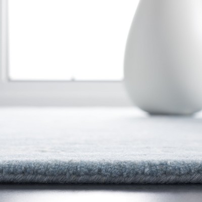 Blue and Ivory Handmade Wool Tufted Area Rug