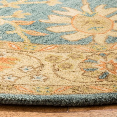 Hand-Tufted Blue and Light Gold Wool Round Area Rug