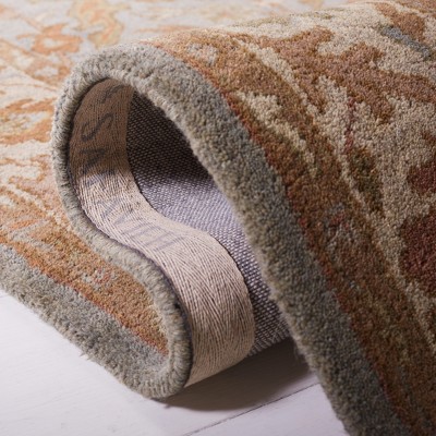Elegant Heritage Hand-Tufted Wool Round Rug in Light Blue