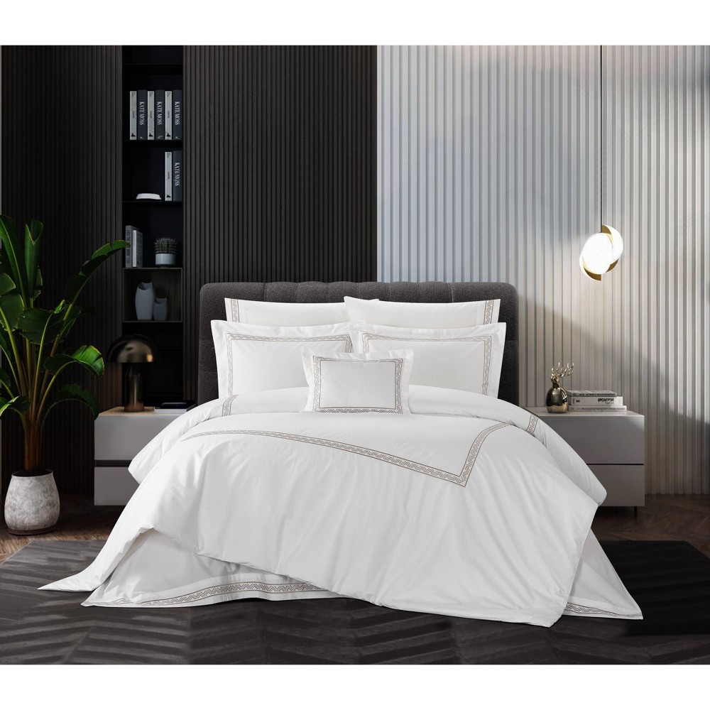 Chic Home Design 4pc  Crysta Comforter Set Give your bedroom a fresh, clean look with the hotel collection inspired Crysta comforter set from Chic Home. The cotton comforter a dual striped embroidered border with zig-zag details and includes two design coordinated pillows shams and a decorative pillow. This contemporary, breathable, and super soft bedding is perfect year-round for a Brooklyn loft or a Miami Beach condo and everything in between. Size: King. Color: Beige. Pattern: Zig Zag.