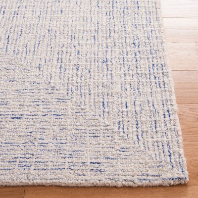Ivory and Blue Handmade Wool Abstract Round Rug