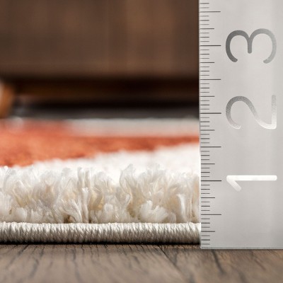 Rust and Ivory Geometric Shag 8' x 10' Synthetic Area Rug