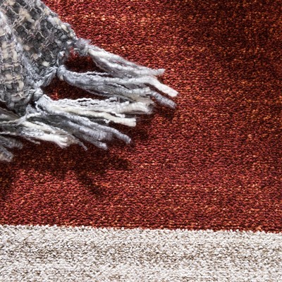 Terracotta and Ivory Tufted Synthetic 6' x 9' Area Rug