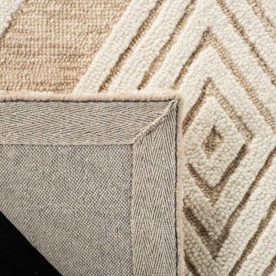Beige and Ivory Floral Tufted Wool 8' x 10' Area Rug