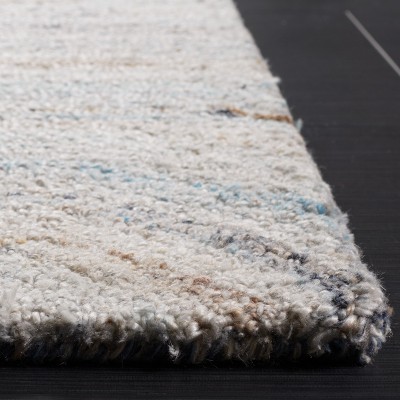 Abstract Blue and Beige Hand-Tufted Wool Area Rug