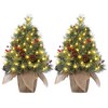 Mini artificial Christmas tree with lights, featuring a burlap base Compact holiday tree adorned with pinecones and clusters of red berries - 2 of 4