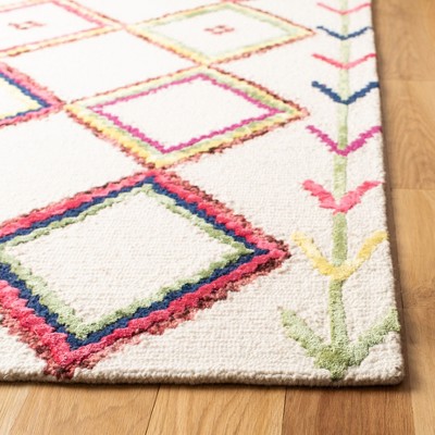 Ivory and Multi Geometric Wool 5' x 8' Area Rug