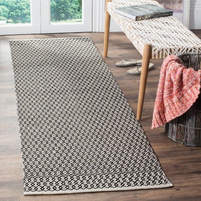 Coastal Charm Ivory & Black Handwoven Cotton Rug - 27" x 16"