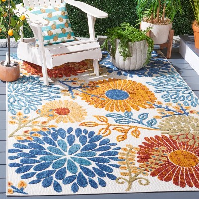 4' x 6' Creme and Red Floral Synthetic Indoor/Outdoor Rug