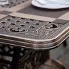Resenkos 7-Piece Patio Dining Set, Six Armchairs And A Matching Table, Cast Aluminum, Bronze - 3 of 4
