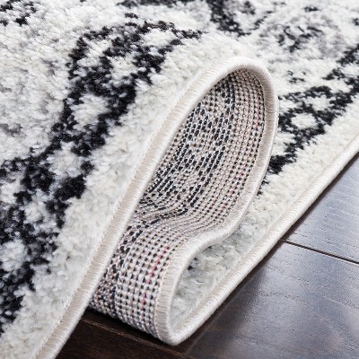 Ivory Round Stain-Resistant Synthetic Area Rug