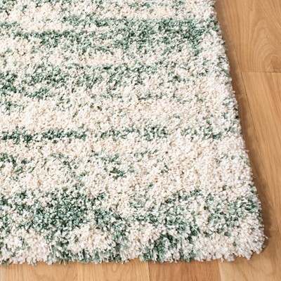 Ivory and Green Round Shag Synthetic Area Rug