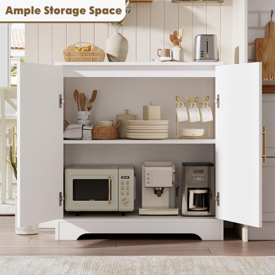 Open cabinet showing interior storage with microwave and appliances