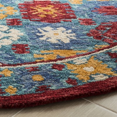 Handmade Blue and Red Wool Geometric Round Rug