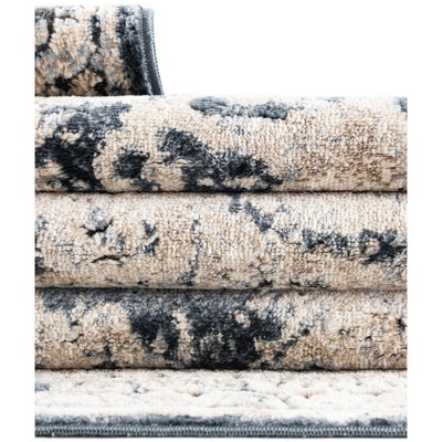 Navy Blue and Beige Distressed Synthetic 6' x 9' Area Rug
