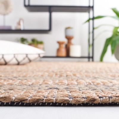 Handmade Black and Natural Cotton Flat Woven Rug