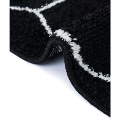 5' Round Black and Ivory Trellis Synthetic Area Rug