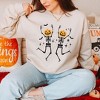 Simply Sage Market Women's Graphic Sweatshirt Pumpkin Skeleton - 2 of 4