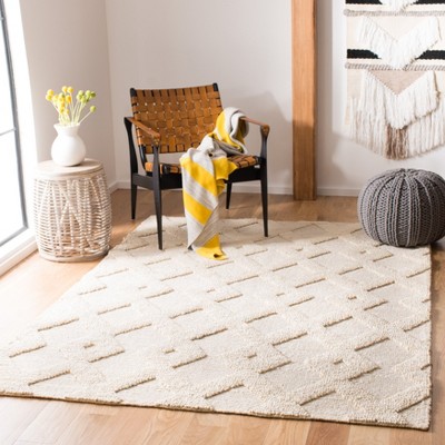 Ivory Flat Woven Cotton and Synthetic 5' x 8' Area Rug