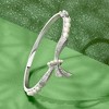 Ross-Simons 2-4.5mm Cultured Pearl and .11 ct. t.w. Diamond Bow Bangle Bracelet in Sterling Silver Size 8 - 3 of 4