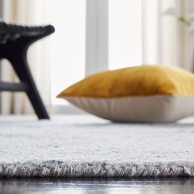 Handmade Black and Ivory Abstract Wool 8' x 10' Area Rug