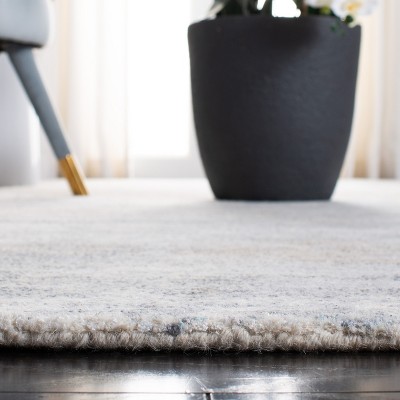 Handmade Blue Wool and Viscose Tufted Area Rug