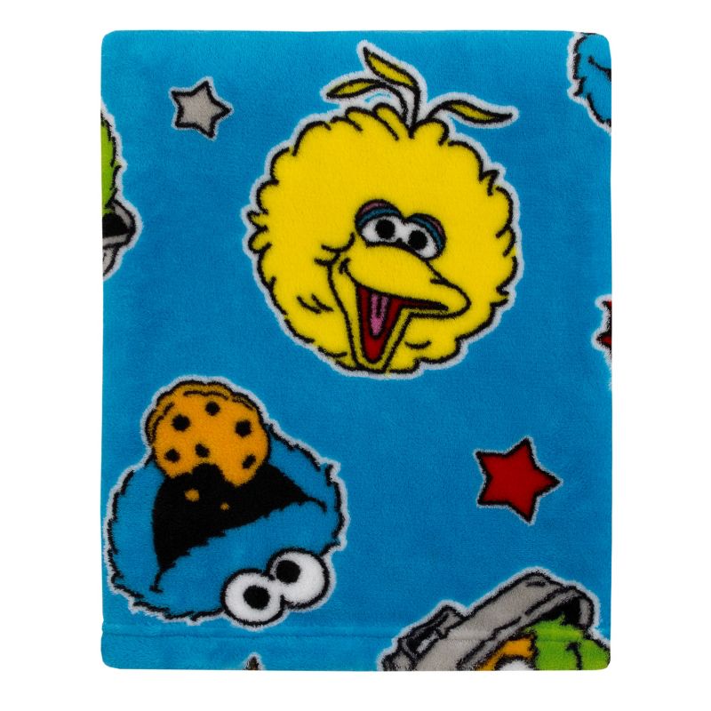 Sesame Street Come and Play Blue, Green, Red and Yellow, Elmo, Big Bird, Cookie Monster, and Oscar the Grouch Toddler Blanket, 1 of 6