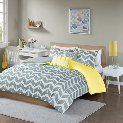 yellow and grey bed sheets