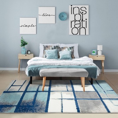 Blue Geometric 9' x 12' Stain-Resistant Synthetic Area Rug