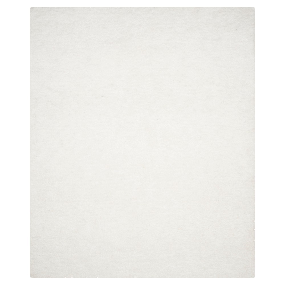 Ivory Solid Tufted Area Rug - (8'x10') - Safavieh