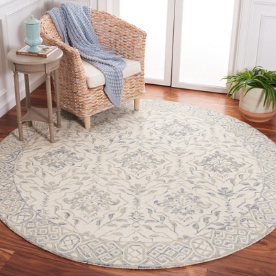 Handmade Light Blue and Ivory Round Wool Area Rug