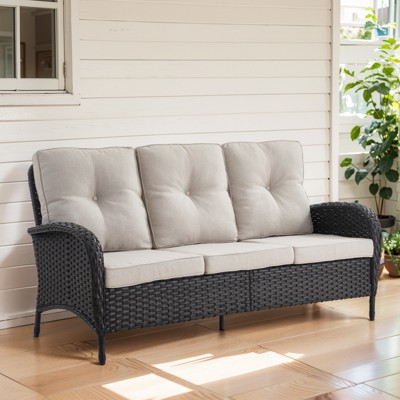 black wicker/beige cushion