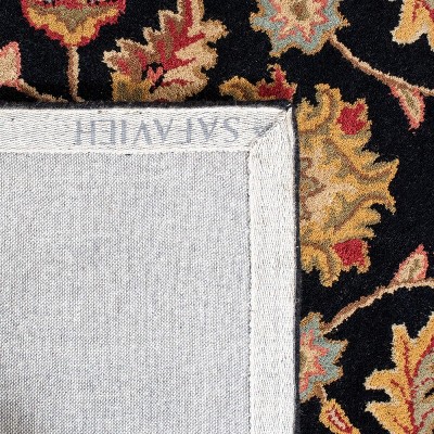 Handmade Black and Gold Wool Traditional Area Rug