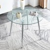 A glass tabletop with a diameter of 40 inches and a modern minimalist circular dining table - 3 of 4