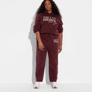 Women's Pretty Brown Ting Fleece Graphic Joggers - Brown - 1 of 3